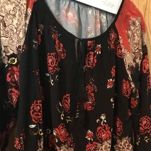 Nice top. It was purchased at a consignment shop.